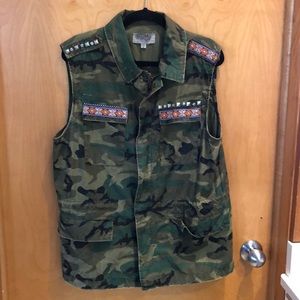 Camo vest with decorative patches, metal studs